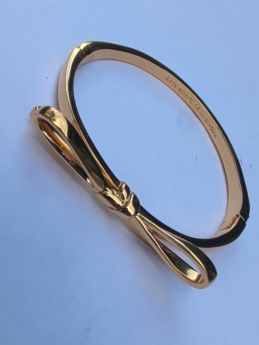 kate spade Gold Bow Hinged Bangle Bracelet - Polished Metallic